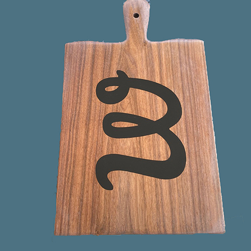 Wooden charcuterie board with custom logo